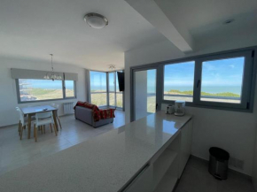 Departamento de lujo frente al mar con vista panorámica, pileta y cochera privada